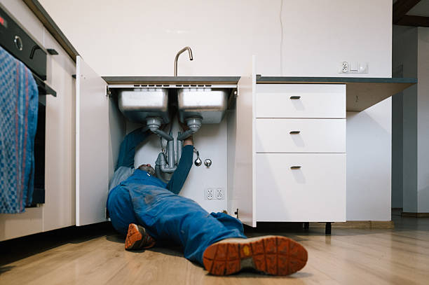 Professional Drain Cleaning technician working in Fairview, MT